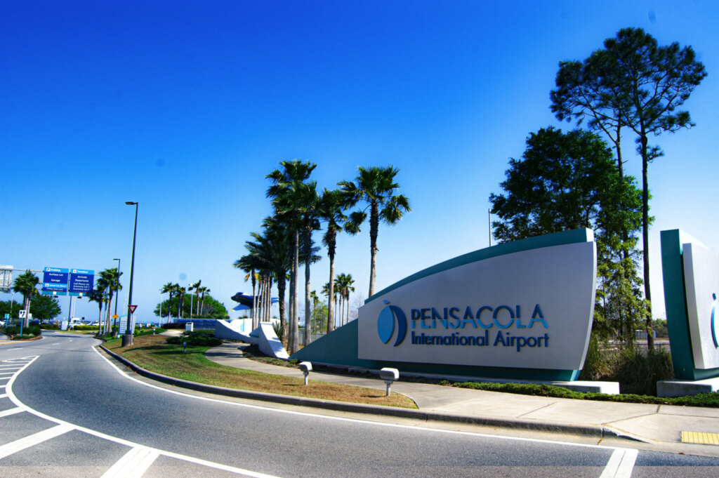 Image of Pensacola International Sign on a Sunny day